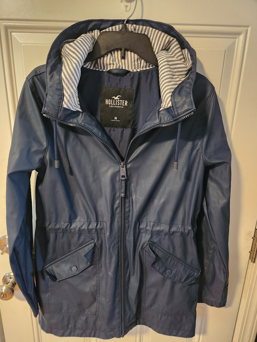 Hollister Women's Navy Hooded Raincoat with Striped Lining Size M